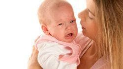 a newborn child often sneezes causes